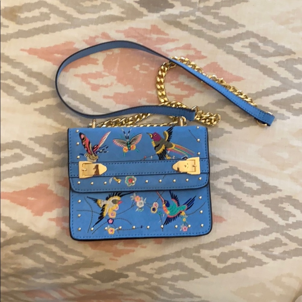 Boutique butterfly and bird design purse.